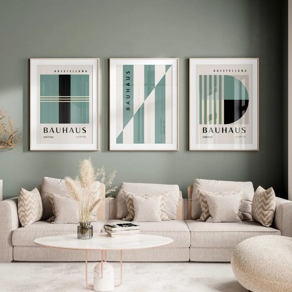 green and sage geometric bauhaus poster set in contemporary office workspace