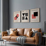 red and black bauhaus wall art set with negative space in modern living room