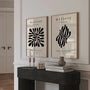 Set of 2 beige abstract posters arranged as gallery wall in modern minimalist interior