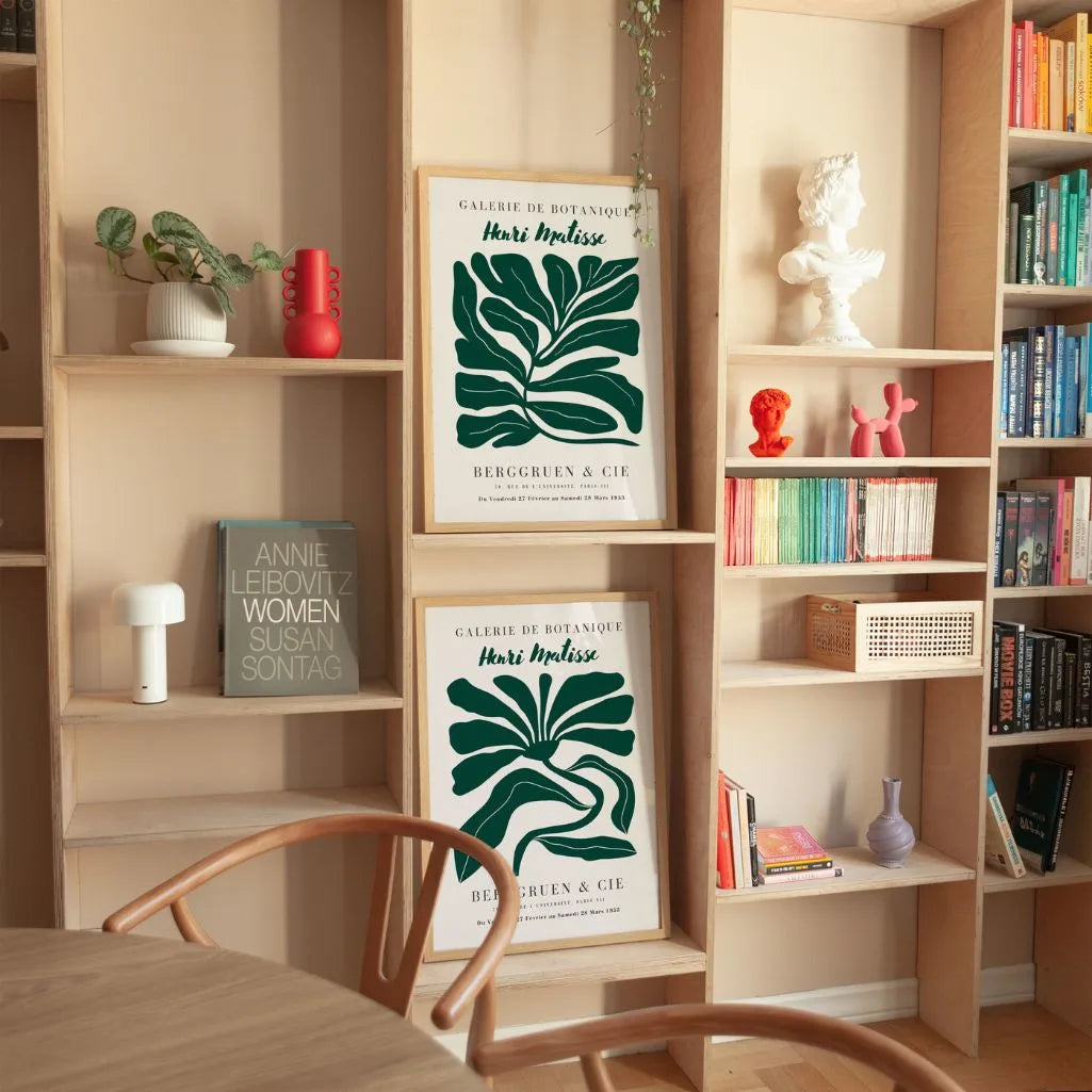 Set of 2 botanical green posters styled in modern living room with minimalist decor