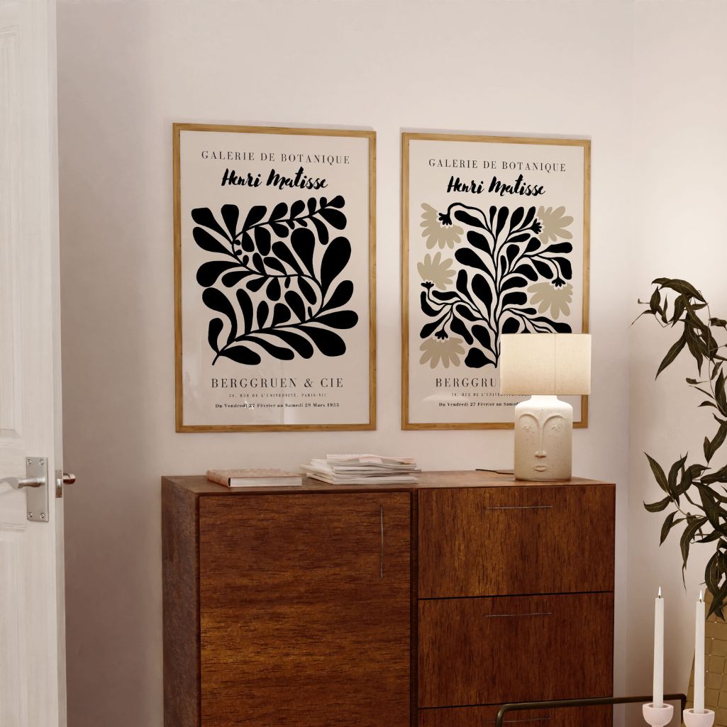 Set of 2 graphic botanical posters arranged as gallery wall in modern interior