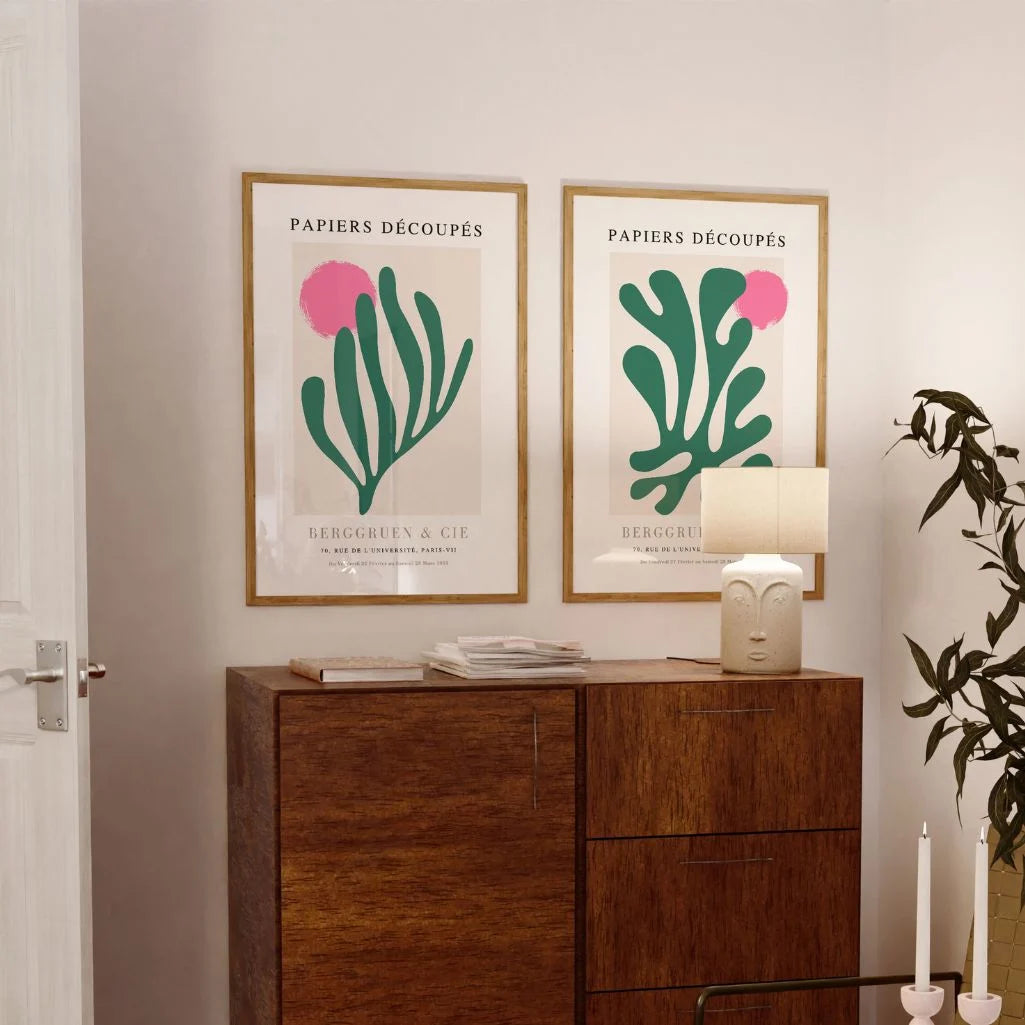 Set of 2 green cutouts posters displayed in gallery wall with modern interior