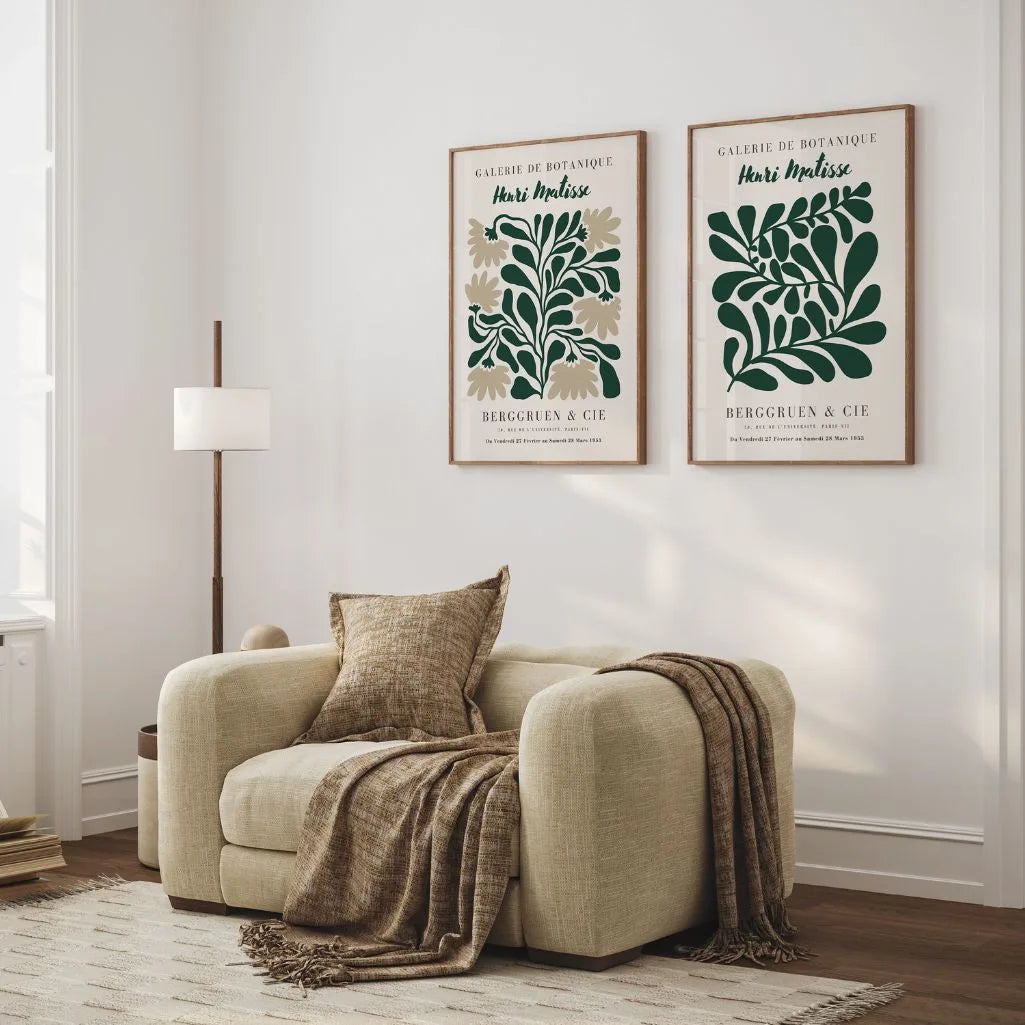 Set of 2 green leaf posters styled in modern living room with natural decor