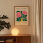Pink peonies poster displayed in gallery wall with floral artwork