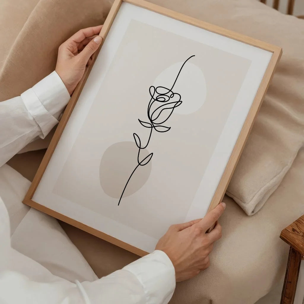 Close up of rose line art poster showing continuous line drawing and beige tones